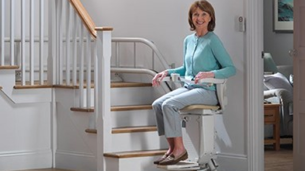 Someone using a stairlift